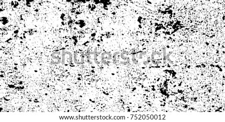 Grunge texture cracks, chips, stains. Abstract pattern of black and white printed items