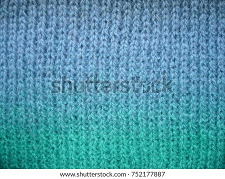 Texture of woolen jersey. Woolen fabric.
