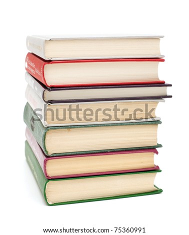 stack of used books on white background