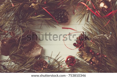 beautiful decoration christmas background with xmas tree, bow and balls. Photo with retro-film effect