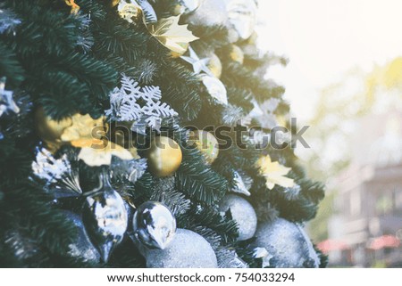 Christmas tree decorated with garlands, close-up use background xmas.