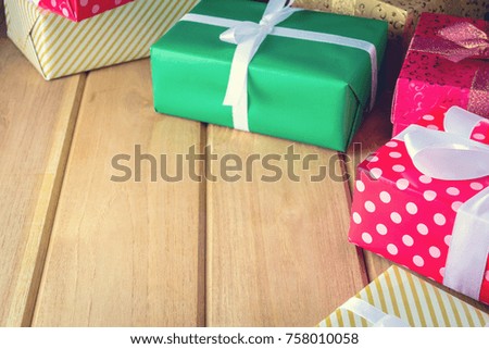 Gift Box Present and decorate on a wooden table with Christmas in the holiday.selective focus