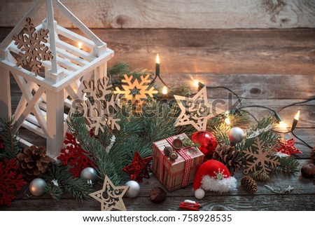 Christmas decoration with white lantern  on wooden background