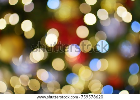 Blur Colorful Background  with Bokeh Light on Christmas Tree