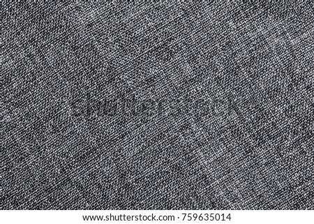 Gray fabric closeup canvas pattern background.