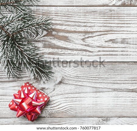 Wooden background. White. Fir branch green. Winter card, holiday gift. Christmas or New Year's Message. Xmas card. Rustic style. Xmas and Happy New Year composition. Flat lay, top view