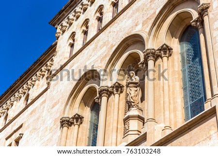View of the facade of the building of the Tarragona Cathedral (Catholic cathedral) on a sunny day, Catalunya, Spain. Copy space for text