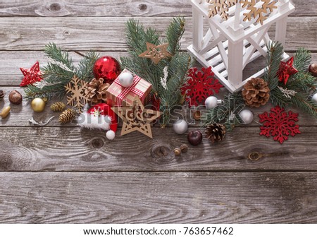 Christmas decoration with white lantern  on wooden background