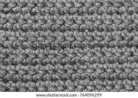 Gray Knitted Wool Background. 
