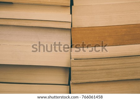 Books background. Old vintage books background. Education and knowledge, learn, study and wisdom concept. Stack of old books. Old books on a shelf, 