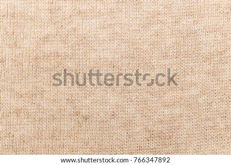 Light beige linen fabric. Textile texture