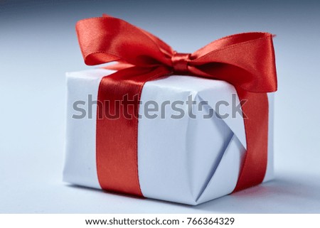 present with red ribbon