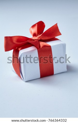 present with red ribbon