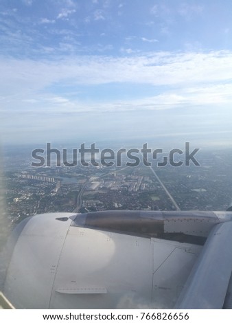 looking the outside through the airplane window.