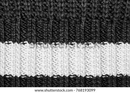 Abstract black and white wool knitted texture closeup