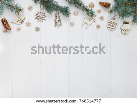 wooden toys lay on the white background with copy space for your text. top view, flat lay. New Year and Christmas concept