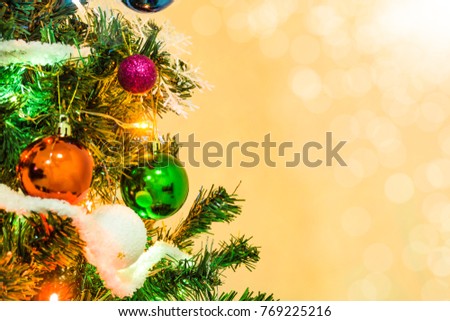 Tree and Christmas decorations. Beautiful decorated with present boxes in a winter landscape with snow. 