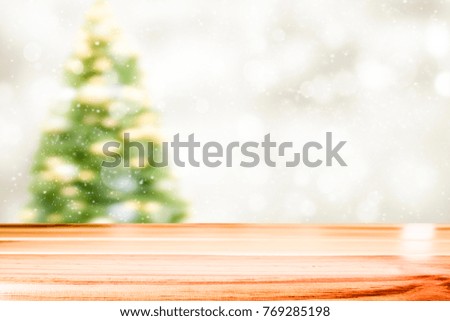 Wood table top on white bokeh abstract background and used for montage or display products

