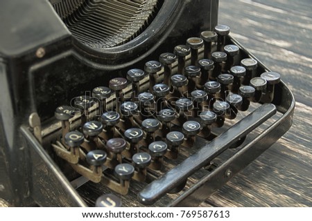 Old and used writing machine. Vintage keyboard of retro typewriter.