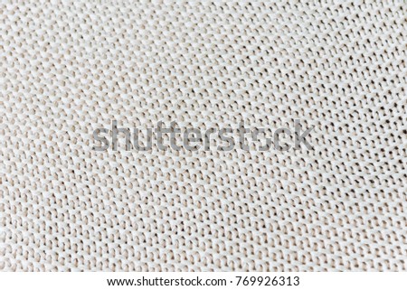 white knitted textured fabric
