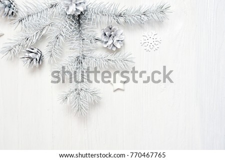 Mockup Christmas frame white tree branches border over white wooden background, with space for your text