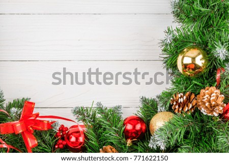white wood background with Christmas tree and decorations