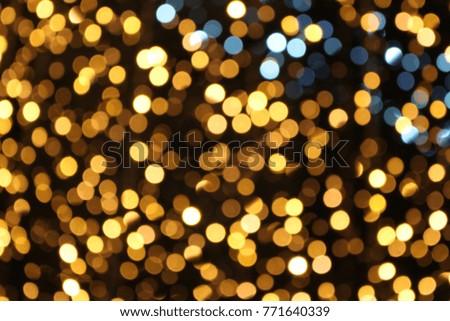 Bokeh of yellow and blue Christmas lights