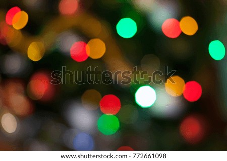 Festive background. Festive texture. Multi-colored lights. Bokeh. Christmas garland