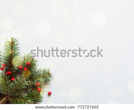 Christmas and Happy new year background with fir-tree branches and christmas decoration, top view. Christmas card