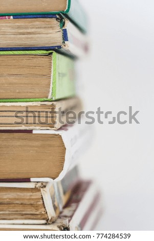 many books standing in a row isolated.