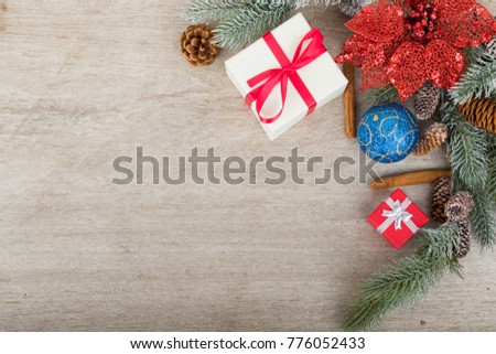 Christmas holidays composition with decorations and gifts on white wooden board background with copy space for your text. Flat lay, top view