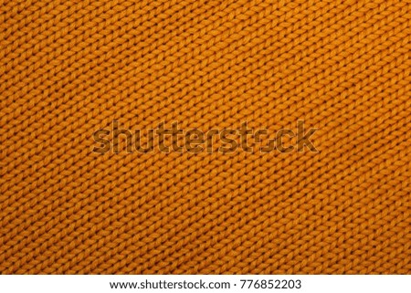 beautiful knitted cloth handmade bright yellow color, closeup