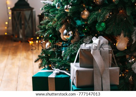 Christmas living room with Christmas tree and gifts under it