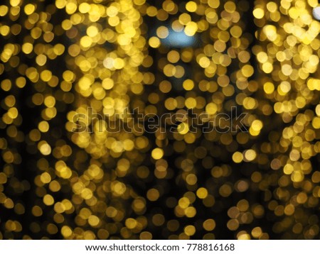 Defocused golden bokeh light background