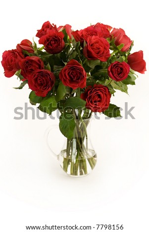 Beautiful red roses in a vase on a white background