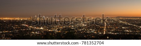 The sun a=has already set in this aerial view of the city skyline Los Angeles 
