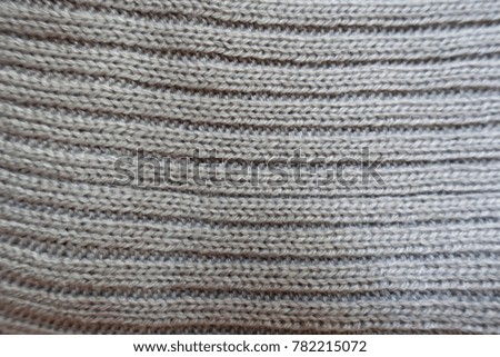Top view of grey handmade rib knit fabric