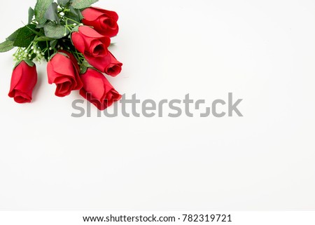 Red Roses On White Background With Empty Space For Text