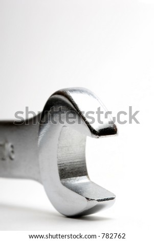 wrench macro - subtle background gradient, shallow dof