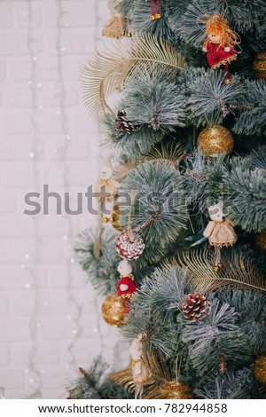 Christmas tree on wooden table, colorful lights on background, new year
