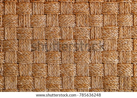 Traditional Thai style pattern nature background of brown handicraft weave texture rattan& wicker surface for furniture material.