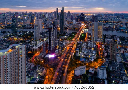 Aerial view of Bangkok Expressway and Highway top view during twilight time ,expressway is an important infrastructure for rush hour in Bangkok,Thailand