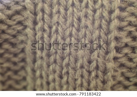 Knitted sweater macro texture in soft lights