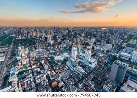 Megapolis during sunset, shooting the city of Bangkok from a tall skyscraper during sunset