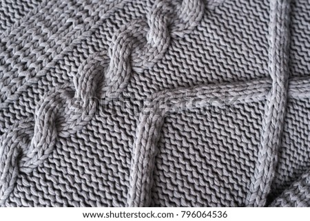 Knitted gray texture, background, sweater. 