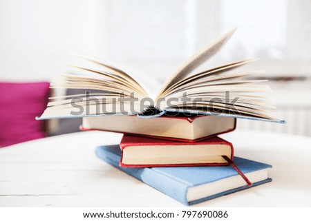 Open Book on white background at home, education and relax