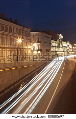 photo car traffic at night on an ancient street.;