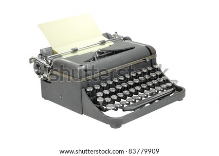 Black worn vintage typewriter on white background
