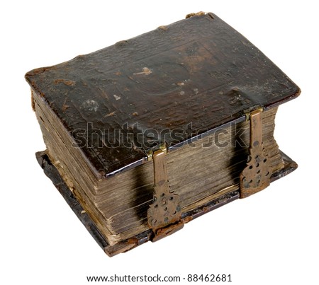 The ancient book in leather reliure on a light background