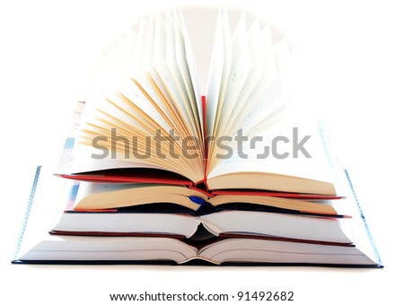 opened large book stack on white background